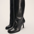 Botas altas de pele preta
